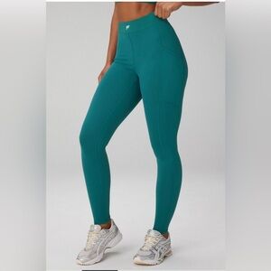 Fabletics On the Go Powerhold High Waisted Leggings
Size M